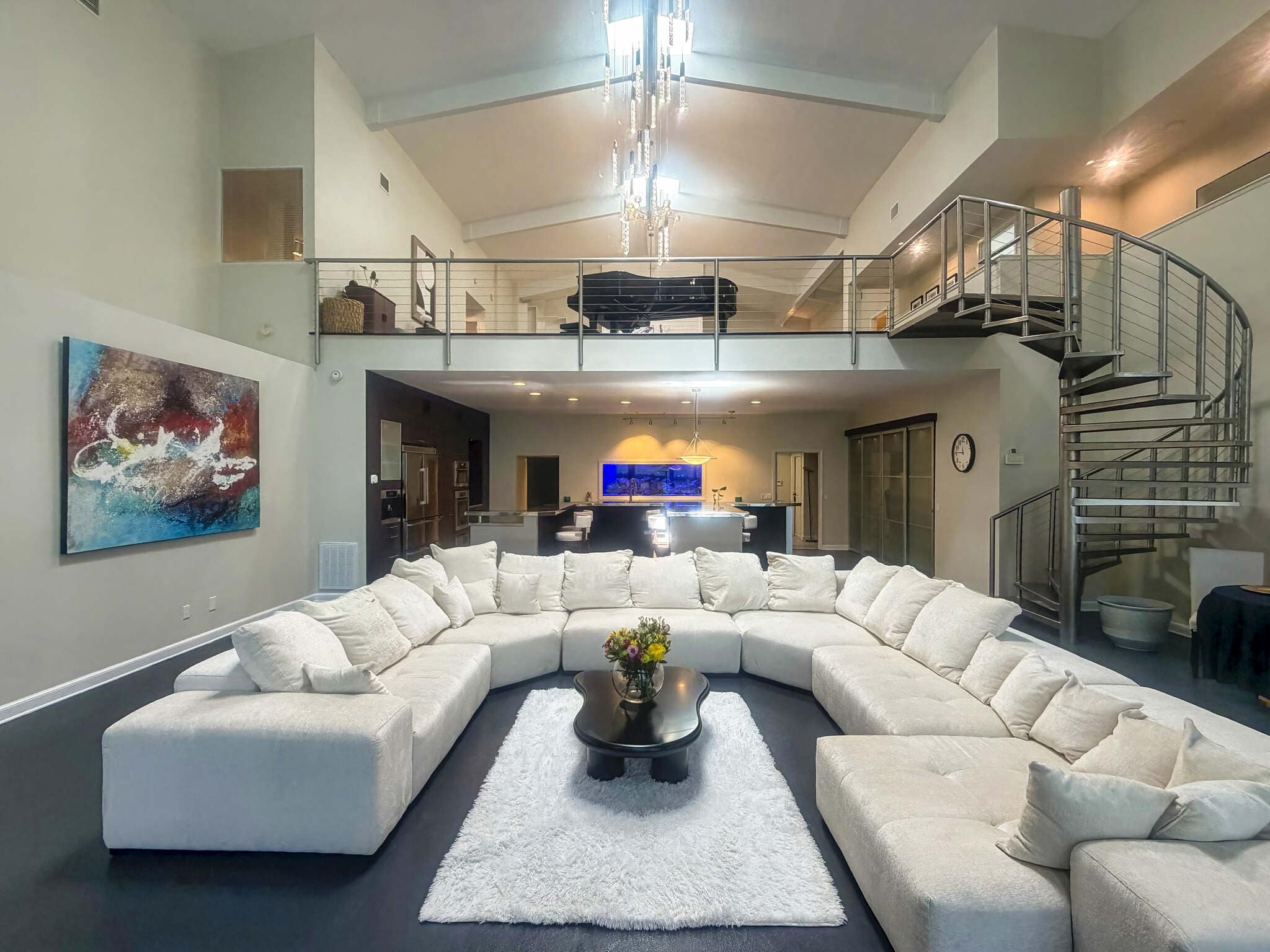 Living Room Area With View of the Loft and Kitchen